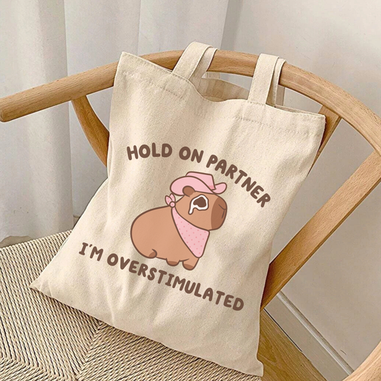Hold On Partner I'm Overstimulated Tote Bag