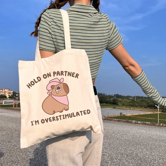 Hold On Partner I'm Overstimulated Tote Bag